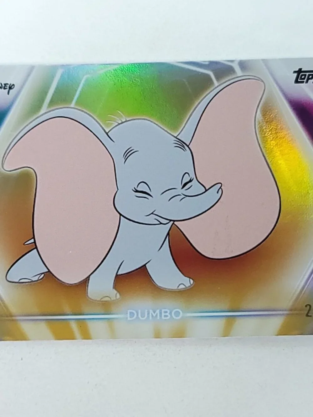 Dumbo Topps 2026 Disney Neon Gold Holo Parallel Limited 29/50 - Picture 1 of 4
